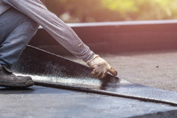 Professional Basement Waterproofing technician working in Milledgeville, IL